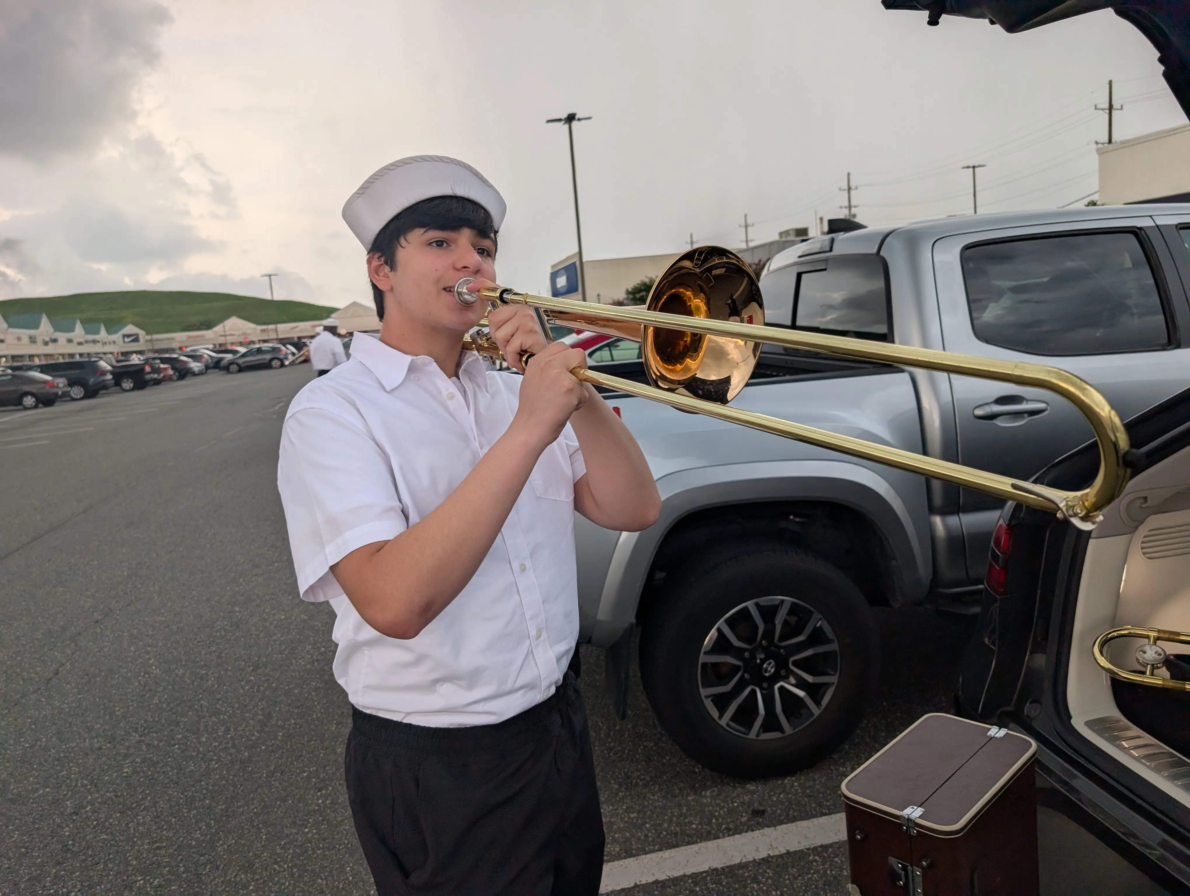 Galileo Solis playing trombone with the Maritime Marching Band at the Second Battalion Parade in Oceanside